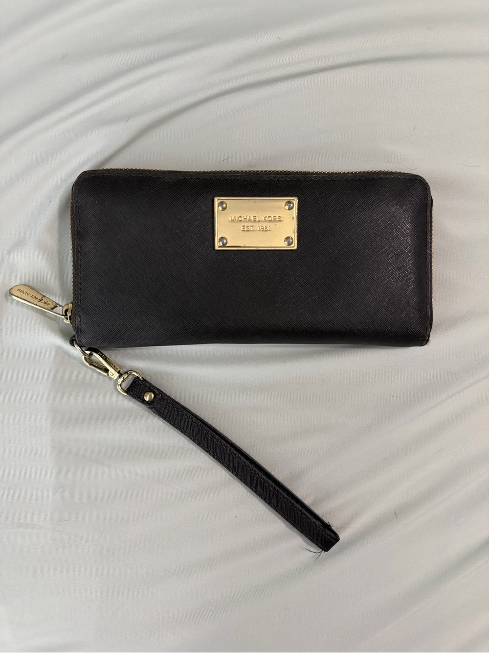Michael Kors Black Leather Zip Wristlet with Gold Plaque
